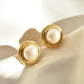 round faux pearl golden earrings with ropy border