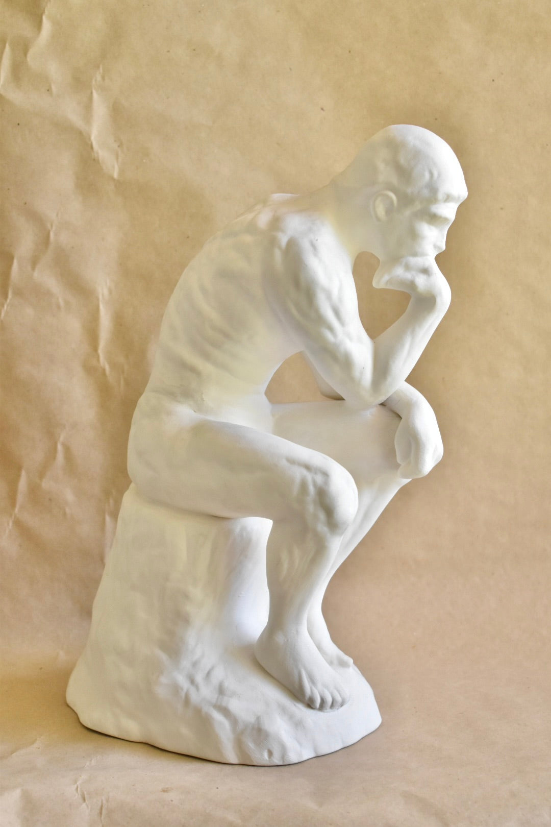 the thinker plaster statue