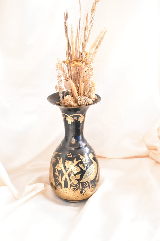 black and gold brass crane vase